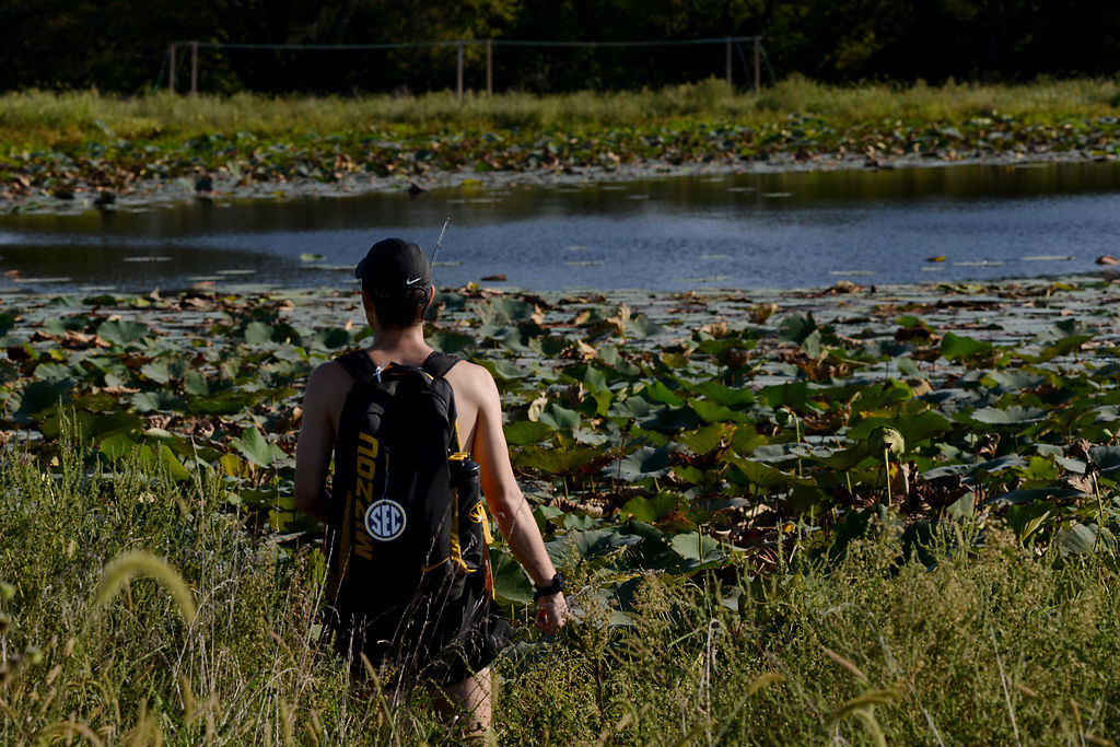 Dustan Davidson explores the area surrounding a lake